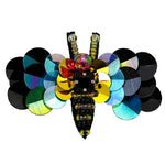 Bee brooch with solar discs