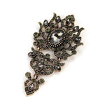 antique eye of fate brooch