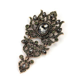 antique eye of fate brooch