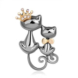 silver cat brooch duo