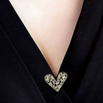 Neckline heart brooch