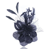 black fabric flower brooch