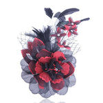 red fabric flower brooch