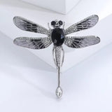 Passionate black dragonfly brooch