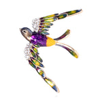 Grandiose purple soaring bird brooch
