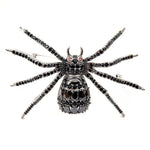 elegant spider brooch