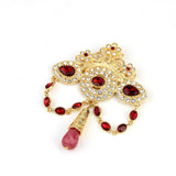 antique red and gold brooch