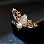 mother-of-pearl bee brooch