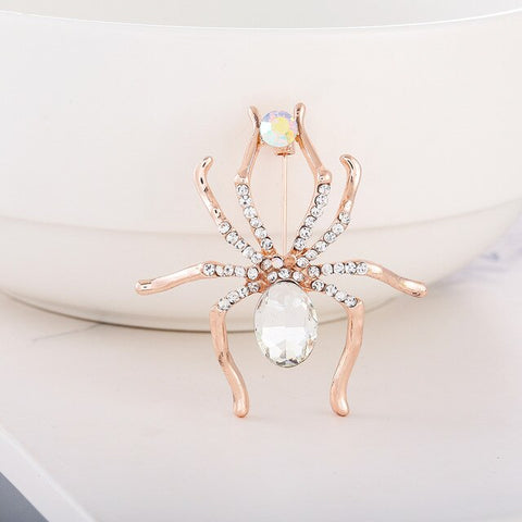 white glass and diamond spider brooch
