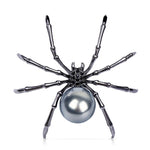 spider brooch with pearl