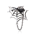 spider brooch in its web