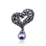 illusion heart brooch
