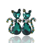emerald duo cat brooch