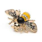 Baby yellow brooch bee