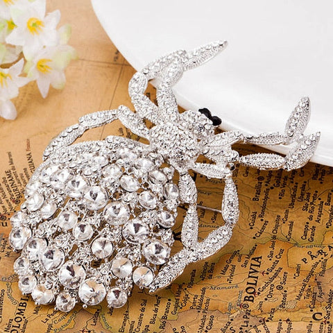 white rhinestone spider brooch