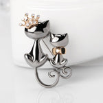 Silver Cat Brooch Duo