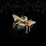 Shimmering Silver Bee Brooch on Black Background